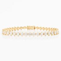 Tennis bracelet in 18K gold with brilliant-cut diamonds.