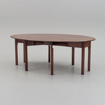 A DINING TABLE, England, made for NK, Nordiska Kompaniet, Sweden. Signed with label. Probably 1960s / 70s.