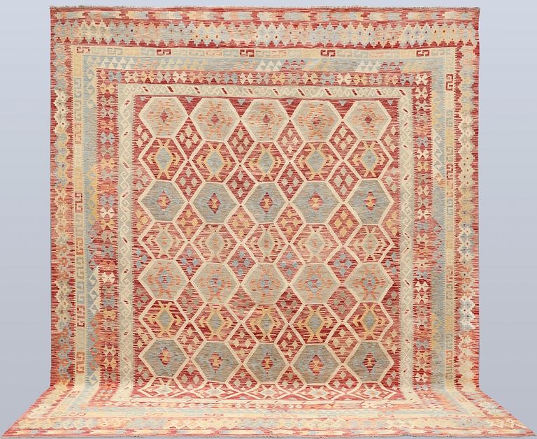 A Kilim carpet, approx. 379 x 313 cm.