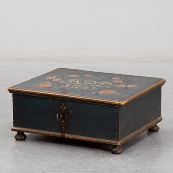 A painted wooden box, marked 1760.