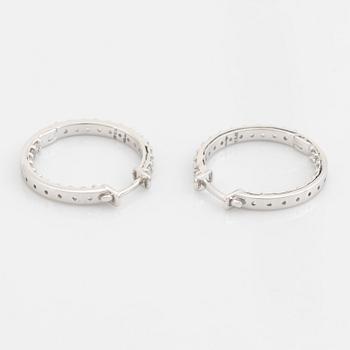 Brilliant cut diamond hoop earrings.