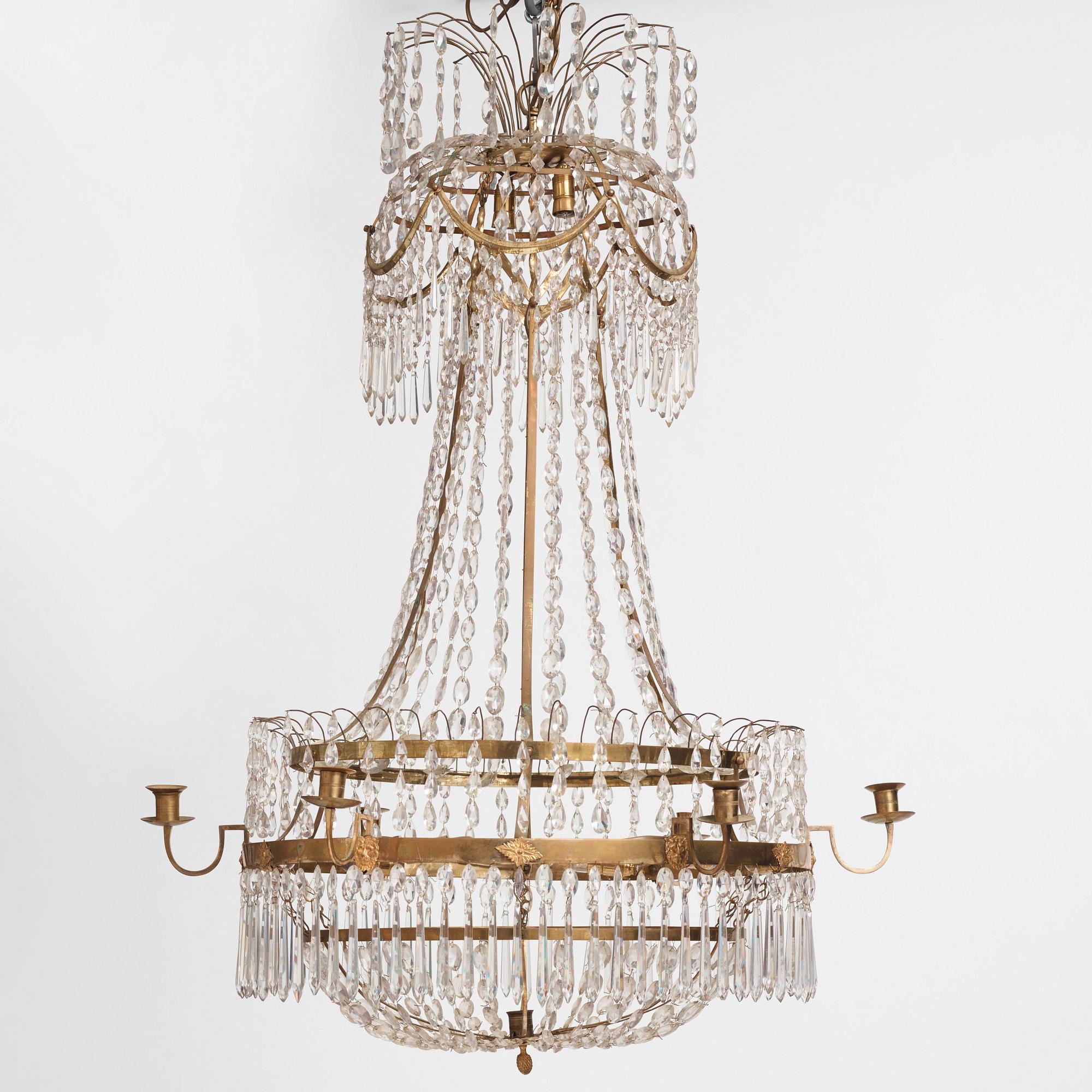 A late Gustavian gilt brass and cut glass seven-light chandelier, Stockholm, late 18th century.
