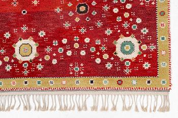 Barbro Nilsson, a 'Rabatten röd' carpet, knotted pile, 266 x 195 cm, signed AB MMF BN.