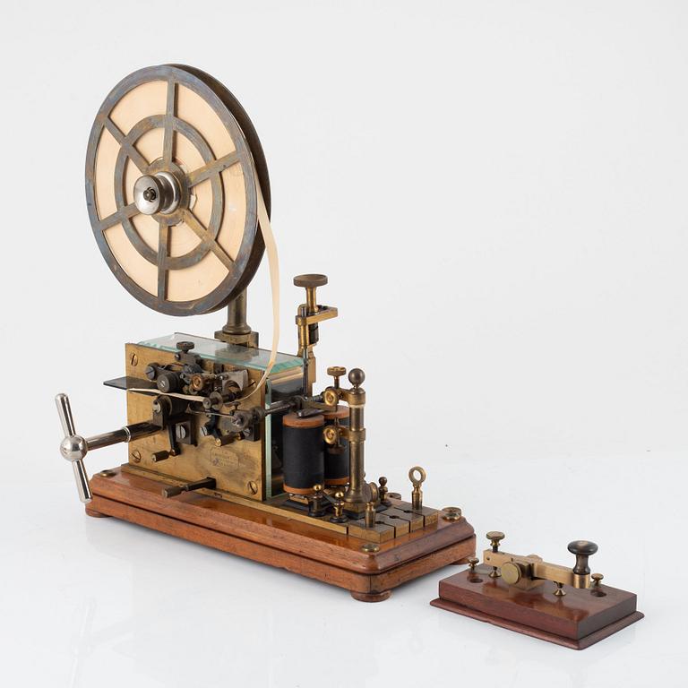 A telegraph from LM Ericsson, and a telegraph key from Digney Frères, early 20th century.