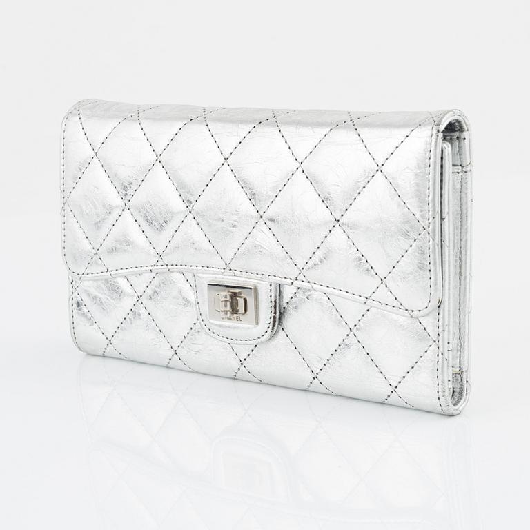 Chanel, a quilted silver leather wallet, 2006-08.
