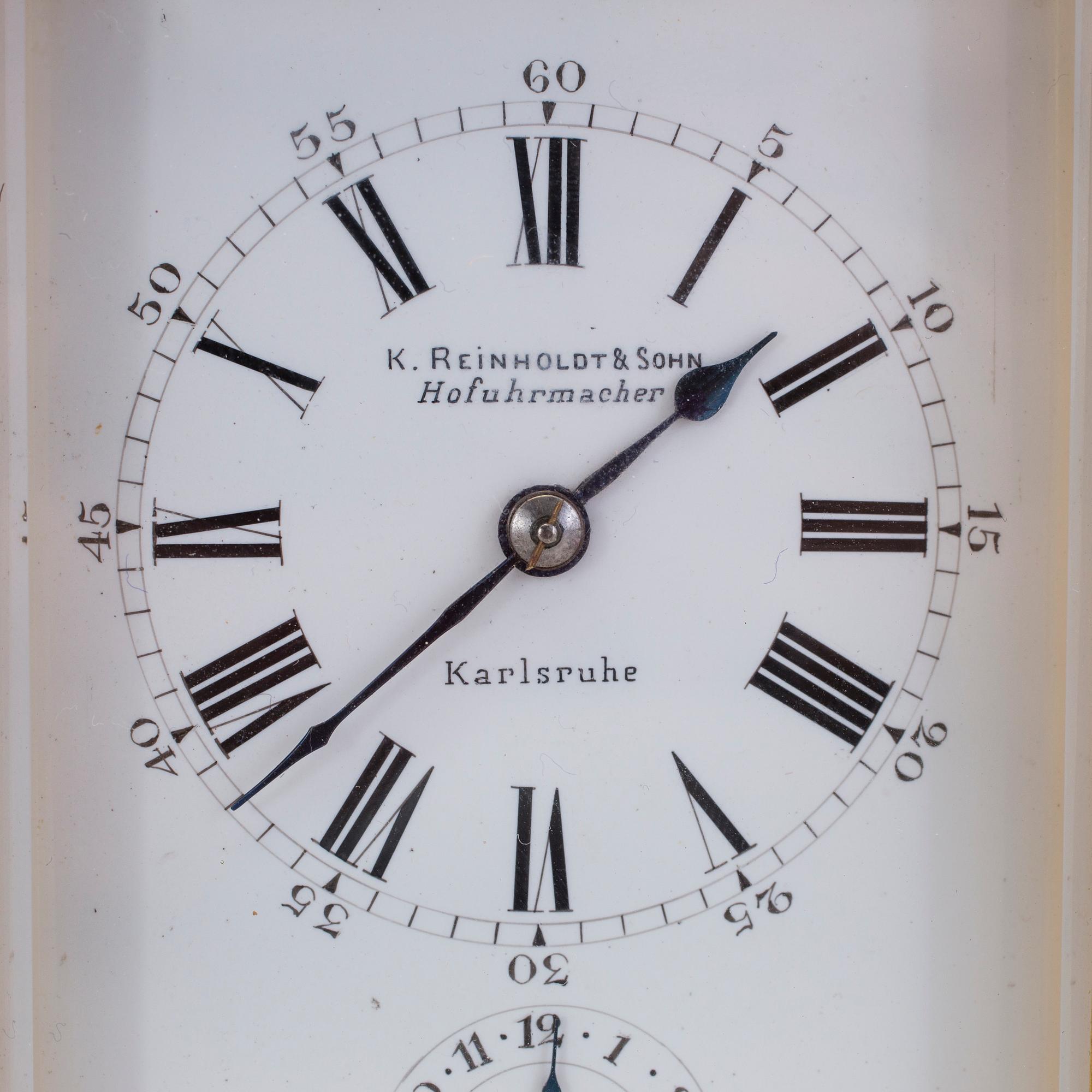 K. REINHOLDT & SOHN, Hofuhrmacher, Karlsruhe - Bordsur / Reseur, 90 x 140 x 80 mm.