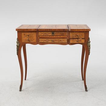 A Louis XV style dressing table, early 20th Century.