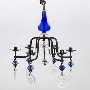 ERIK HÖGLUND, a cast iron and glass chandelier.