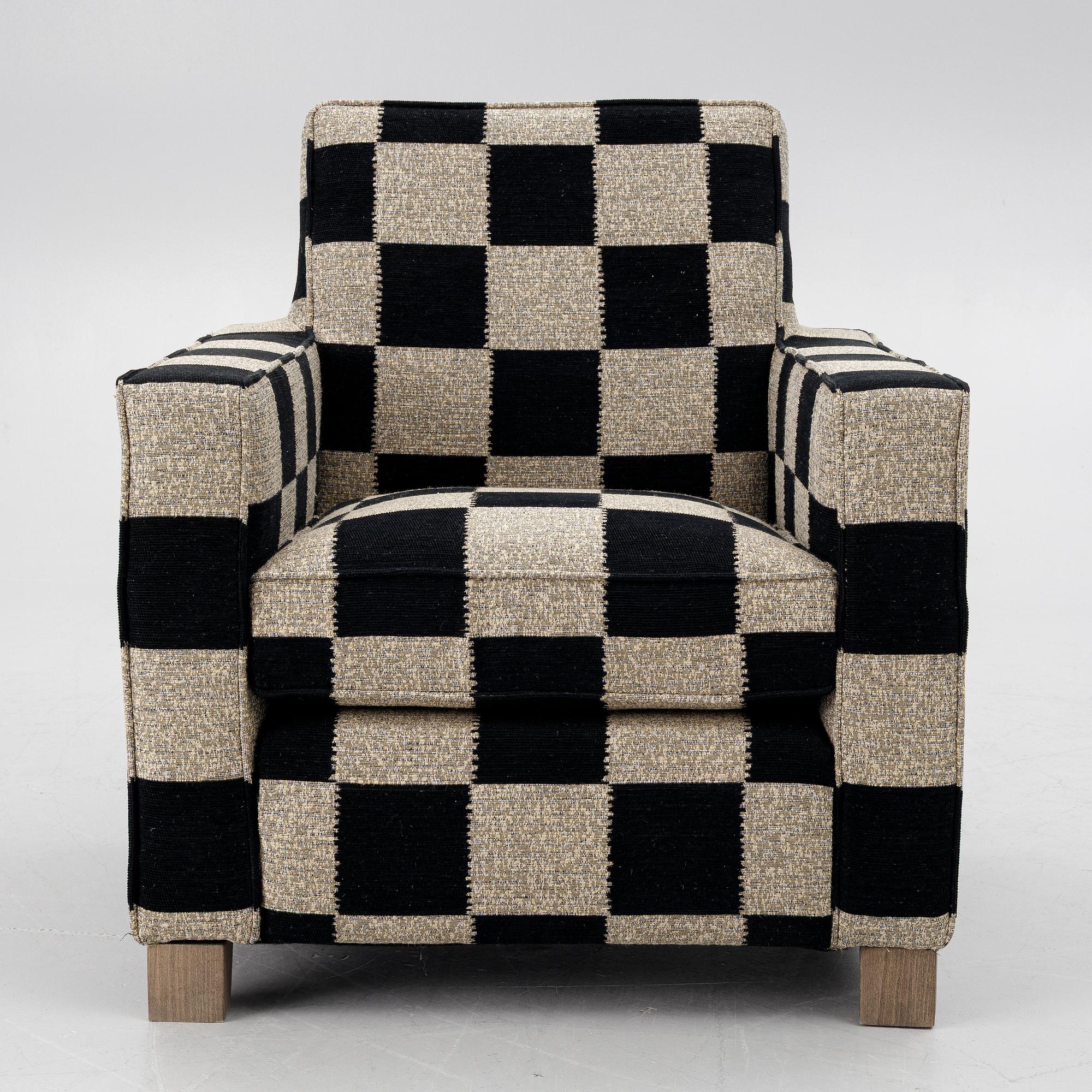 A 'Caspian Club Chair' by RIJD, contemporary.