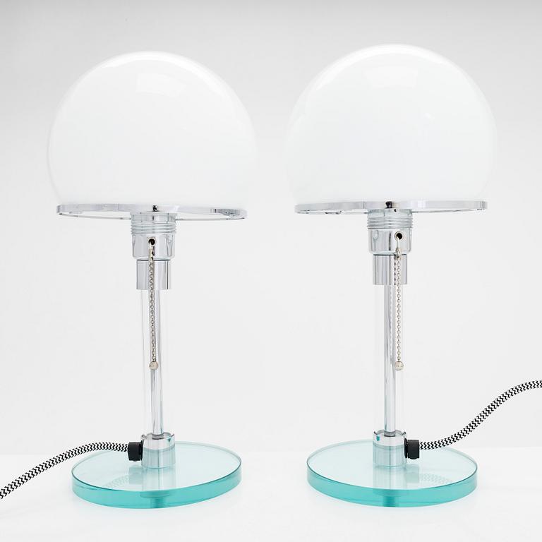 Wilhelm Wagenfeld, a pair of Bauhaus style 'WG24' table lights, Egoluce, Italy, 2000s.
