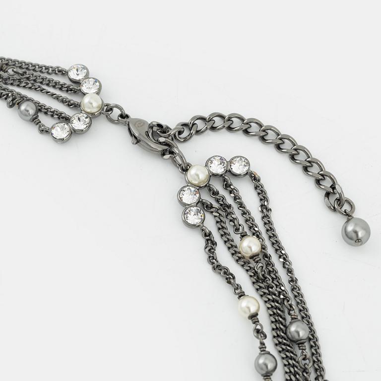 Chanel, a four-layered chain with imitation pearls and strass, 2020.