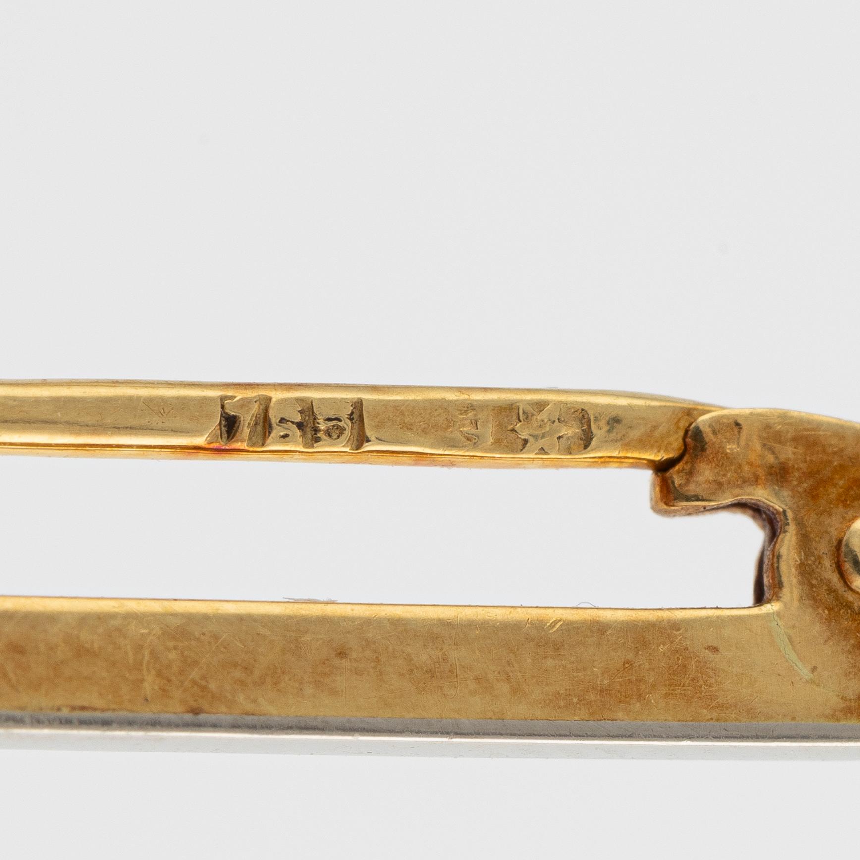 Brooch pin 18K gold with cushion-cut aquamarine and seed pearls.