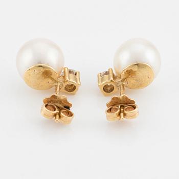Earrings, a pair, with cultured pearls and brilliant-cut diamonds.