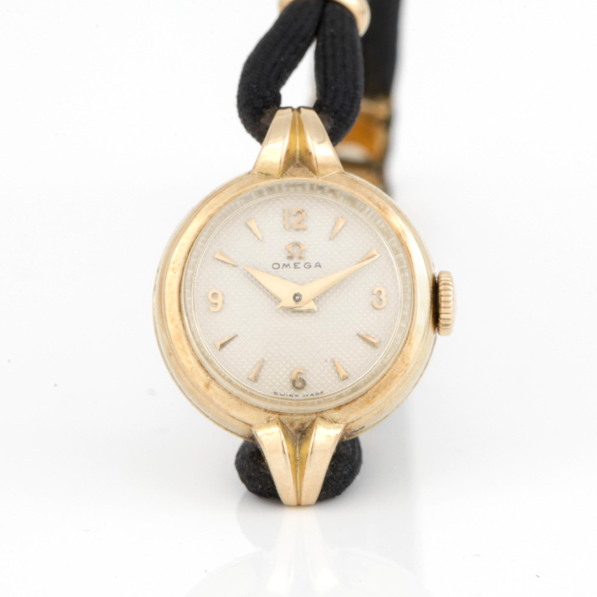 DAMARMBANDSUR, Omega, 1940-tal, boett 14 k guld.