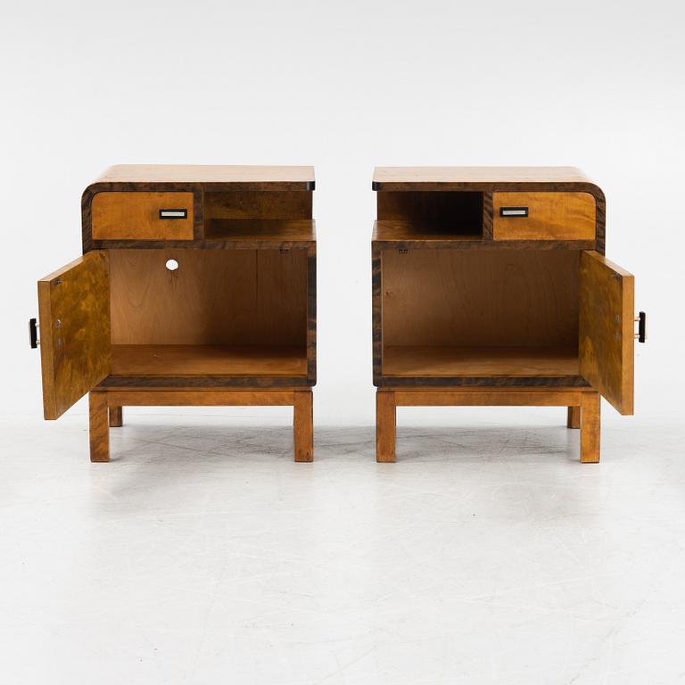 A pair of birch veneered 1930's bedside tables.