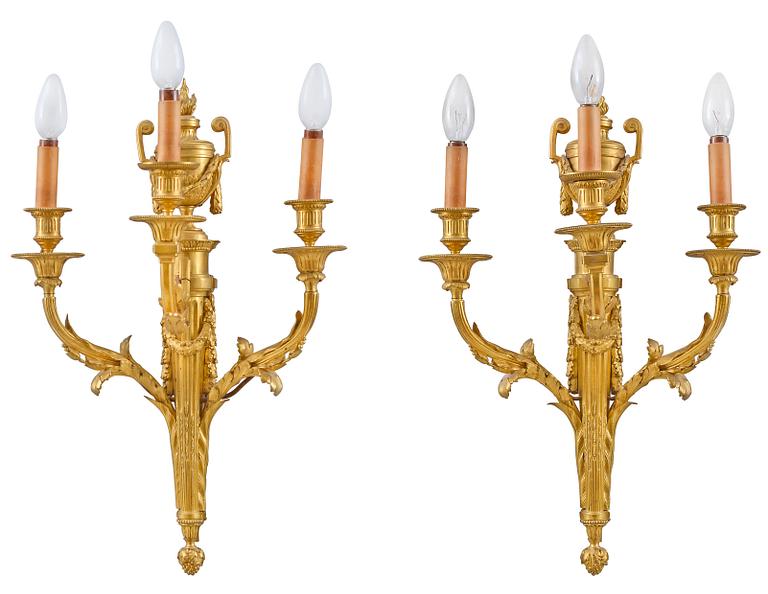 A PAIR OF THREE-LIGHT WALL APPLIQUES.