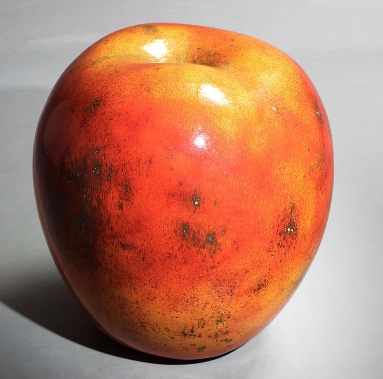 A Hans Hedberg faience sculpture of an apple, Biot, France.