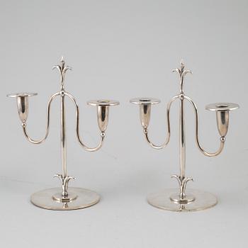 a pair of Elis Bergh silver plated candelabras, Swedish grace, CG Hallberg, Stockholm, 1920s.