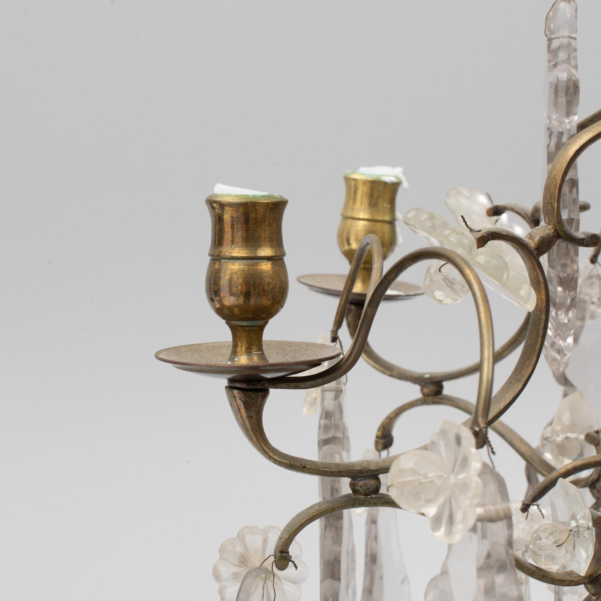 A Rococo style chandelier, early 20th century.