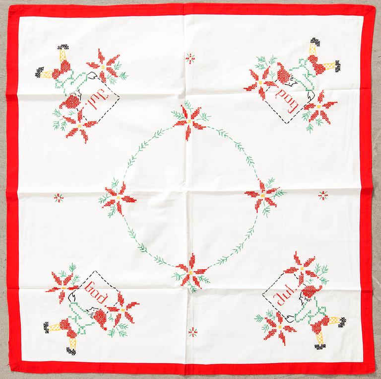 A collection of smaller Christmas tablecloths, runners, wall hangings, curtains, and Christmas tree skirts, 32 pcs, 20th century.