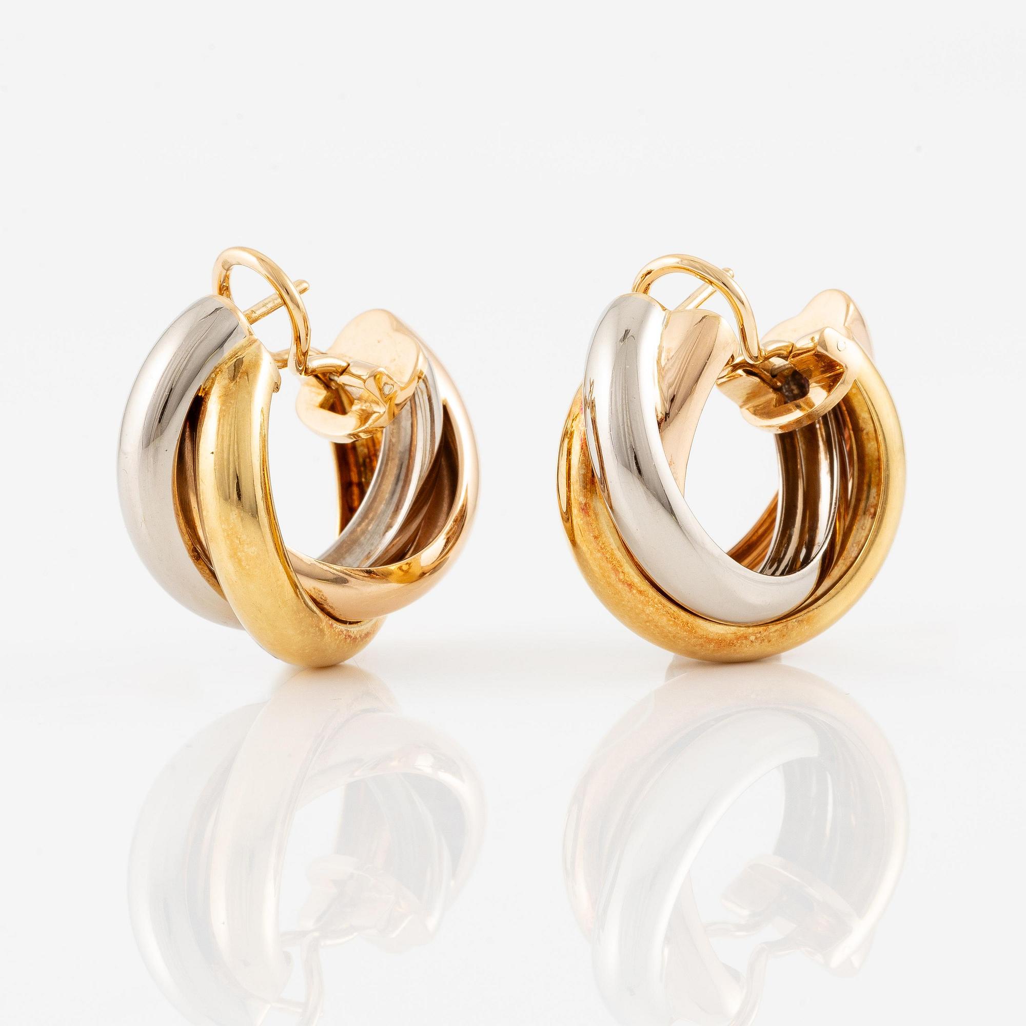 Cartier a pair of "Trinity" earrings in 18K gold in three colours.