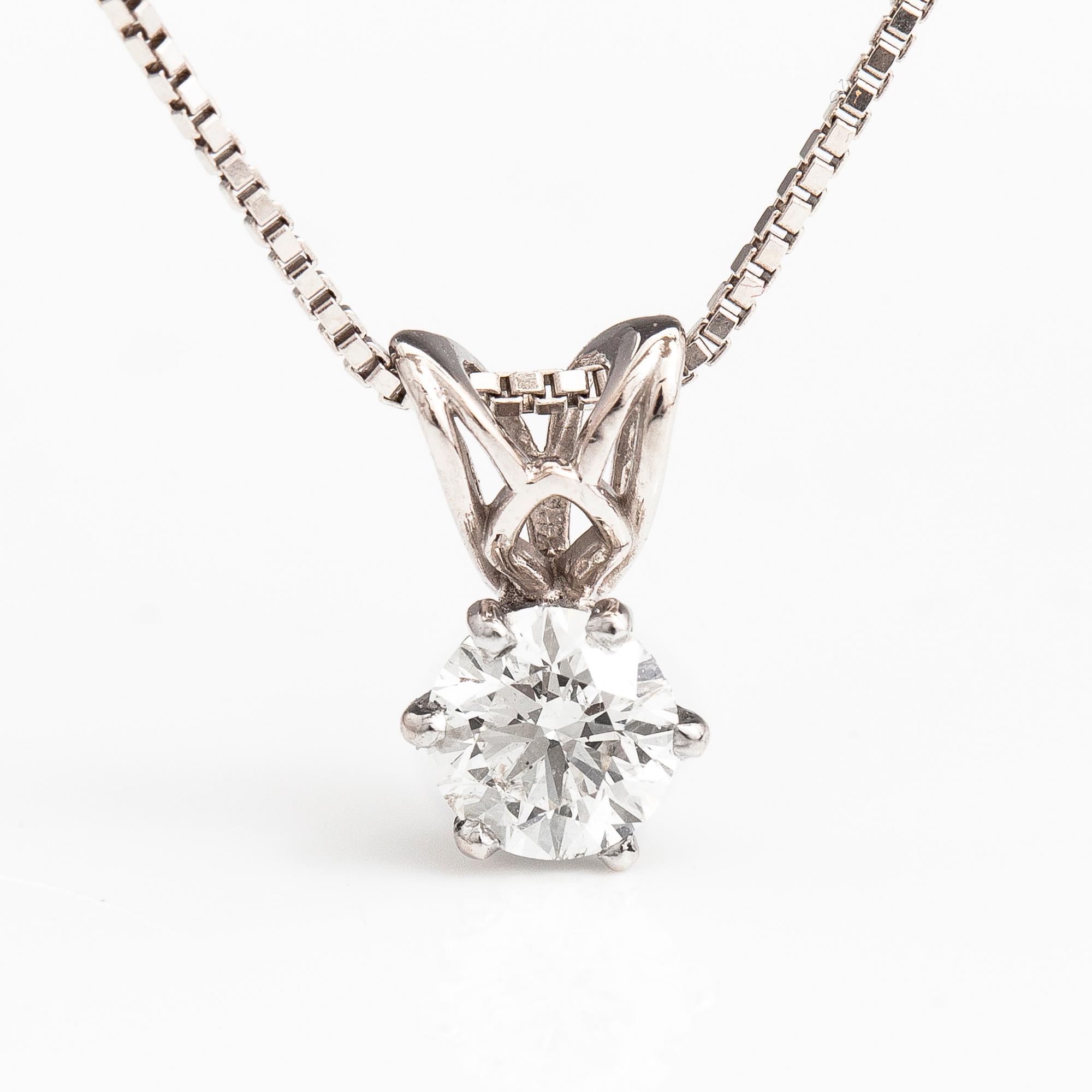 A 14K white gold neclöace with a ca. 0.50 ct brilliant cut diamond.