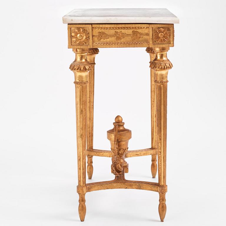 A Gustavian carved giltwood and marble console by O. C. Lindmark (master in Stockholm 1779-1813).