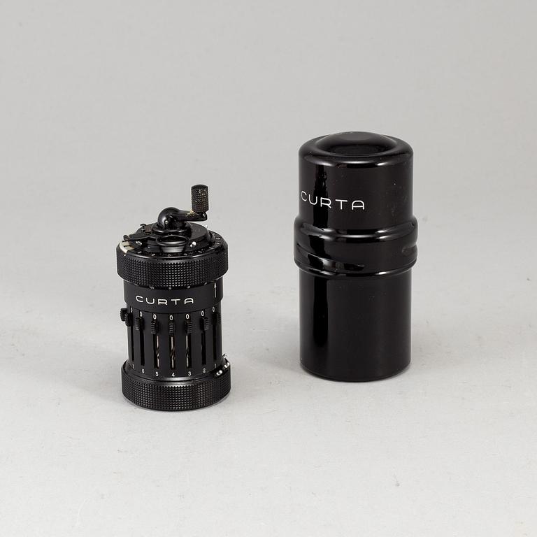 A 'Curta, Type I' calculator developed by Curt Herzstark, Contina AG Mauren, Lichtenstein, designed in 1947.