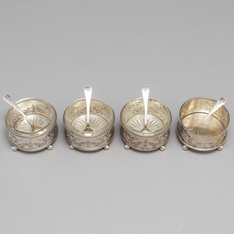 A set of four Fabergé salt-cellars and spoons, marked Moscow 1908-1917. Imperial Warrant.