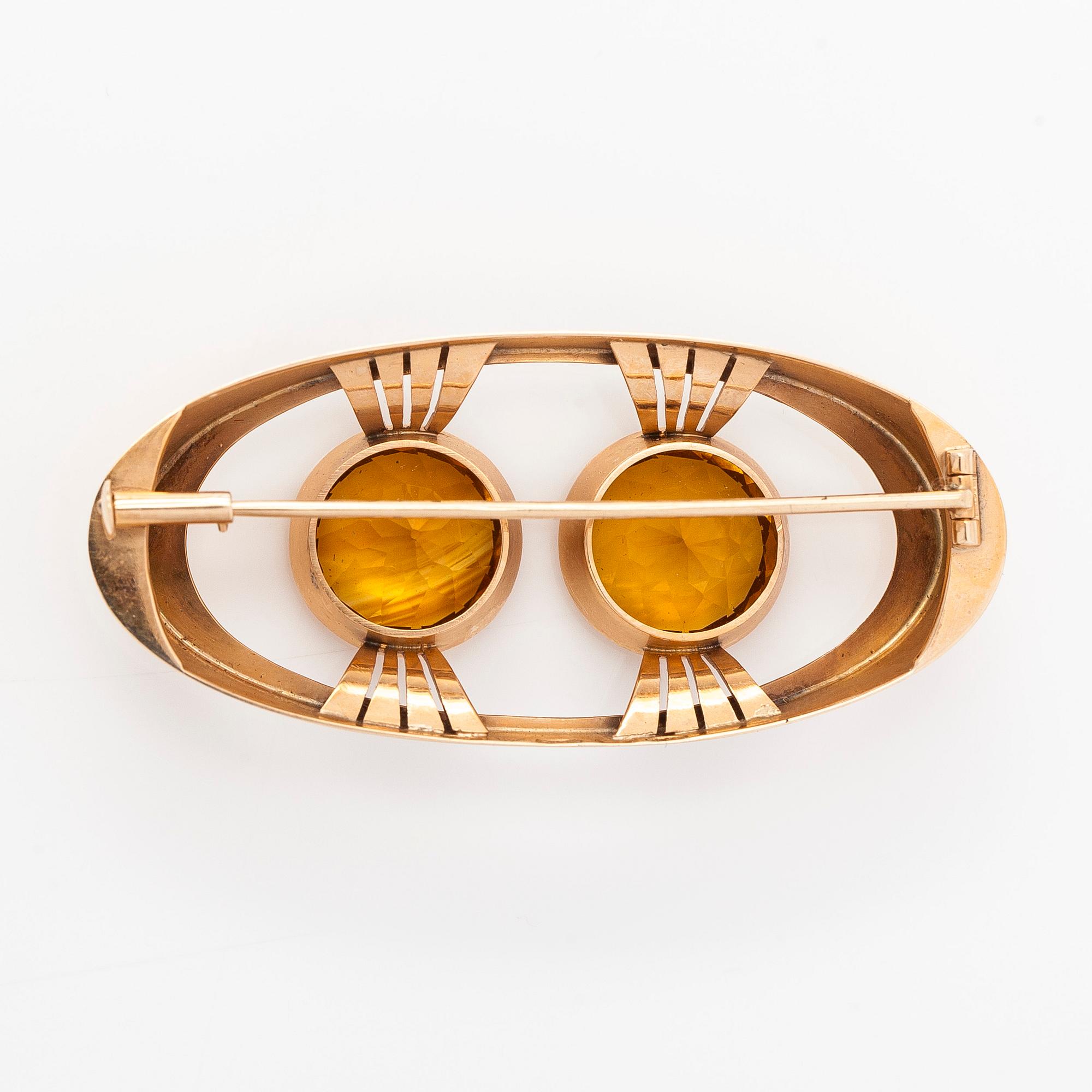 Brosch, 14K guld med citriner. Kaisaniemen Kello ja Kulta 1965.