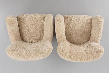 Fritz Hansen, a pair of easy chairs model "1669", Denmark, 1940s.