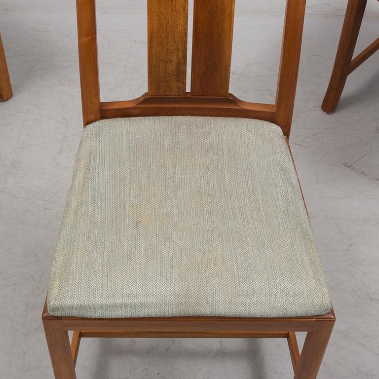 A Carl Malmsten "Ambassadör" dining table and four chairs  , second half of the 20th century. One extension leaf.