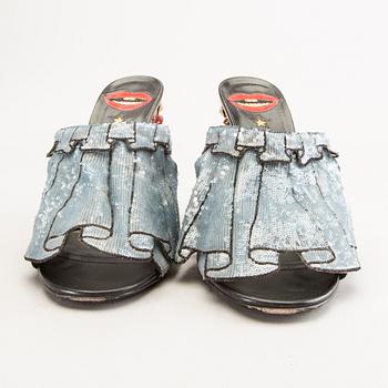 Gucci,.