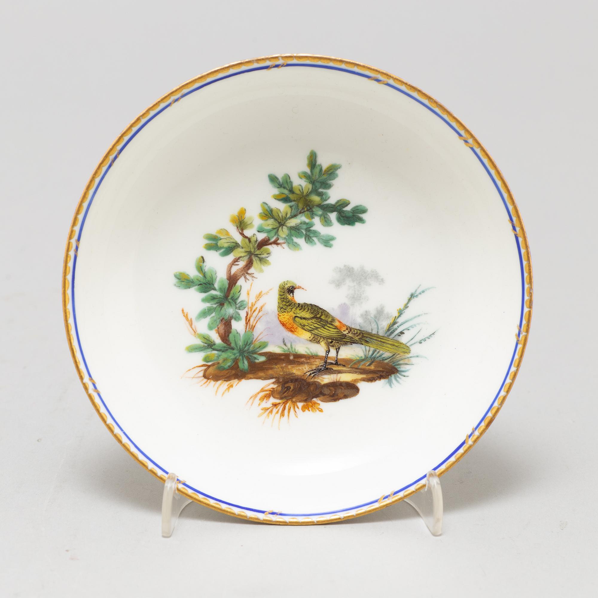 A pair of cups and saucers, "Sévrès"like mark, 19th century.