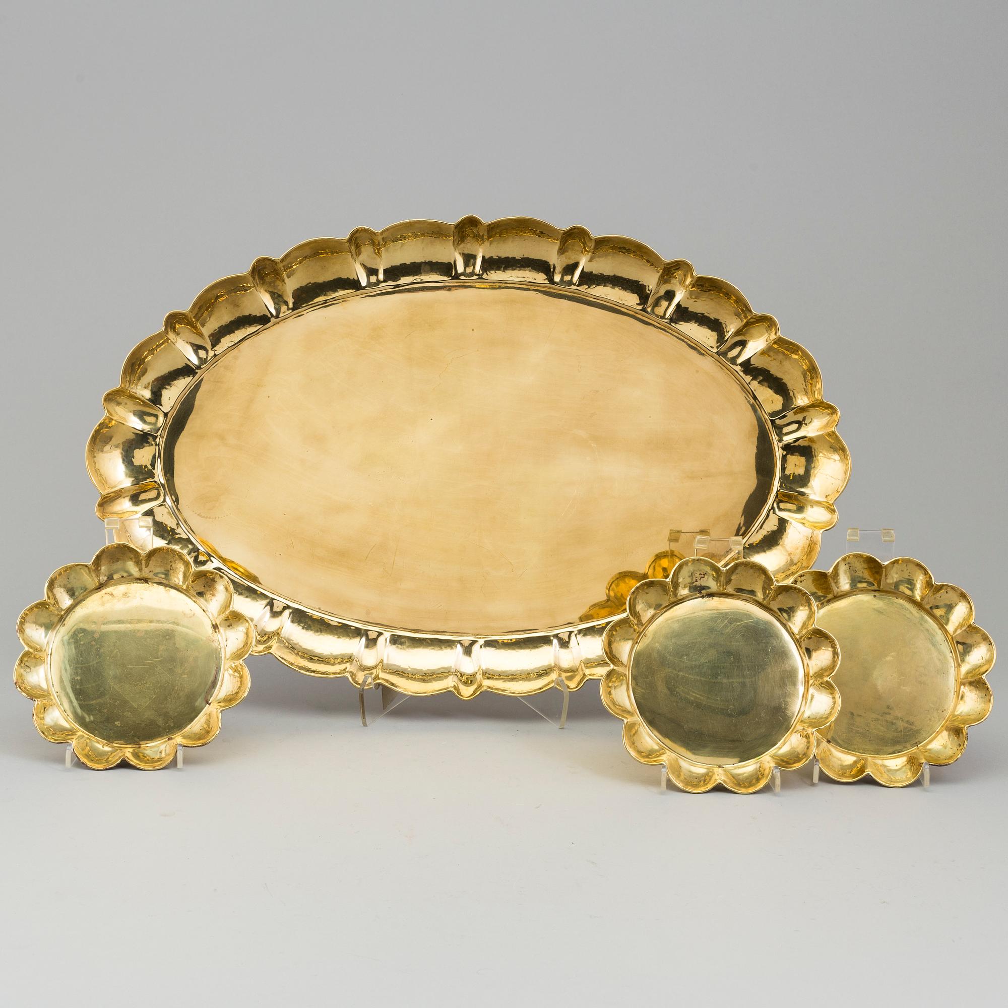 LARS HOLMSTRÖM, a brass tray and a set of 3 plates, from Arvika.