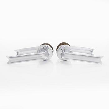 A set of six 1960s-1970s door handles.