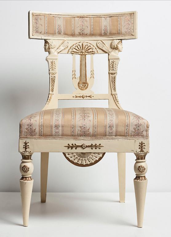 A pair of late Gustavian early 19th century chairs in the manner of Carl Christoffer Gjörwell (1766-1837).