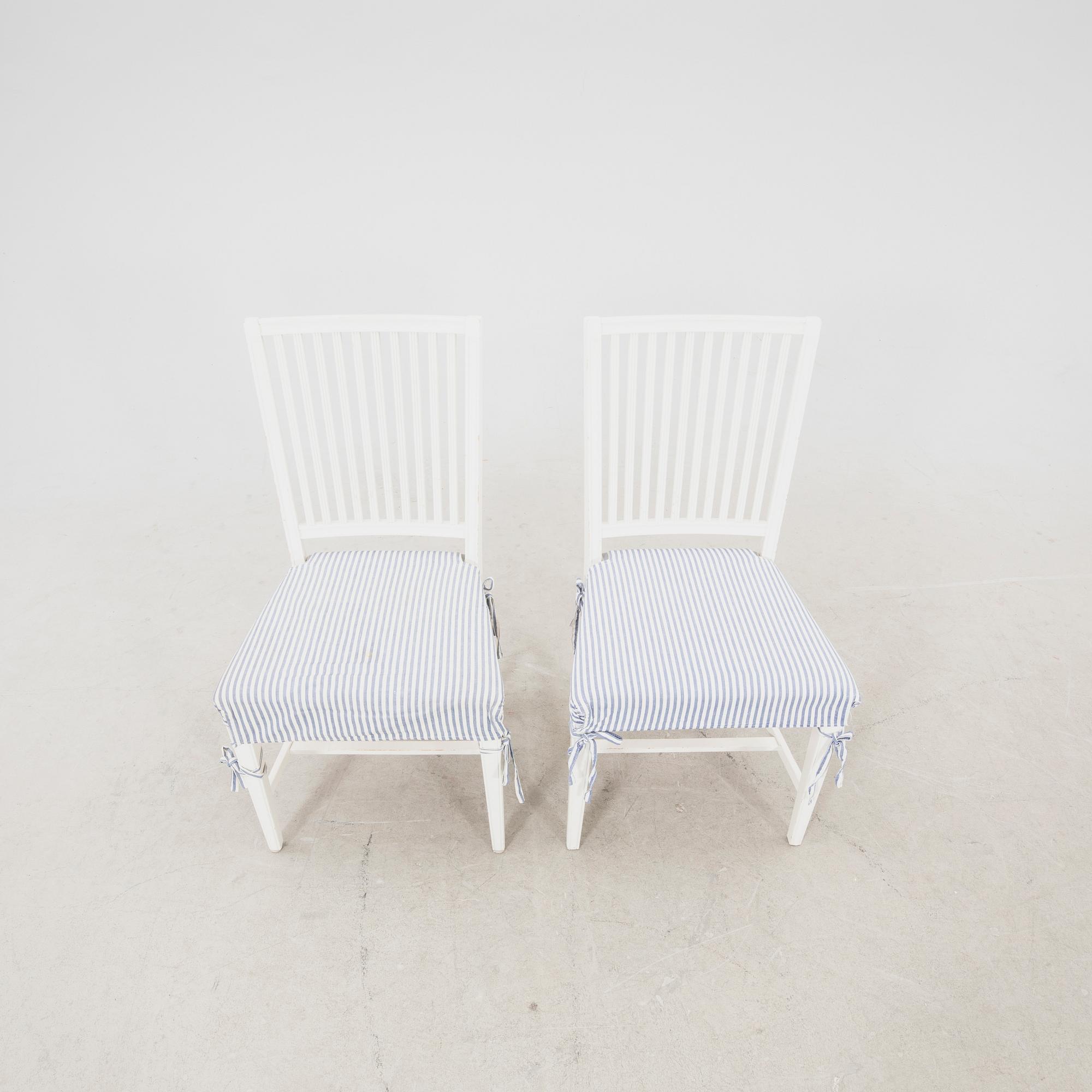 A set of 10 painted Gustavian style chairs from IKEA later part of the 20th century.