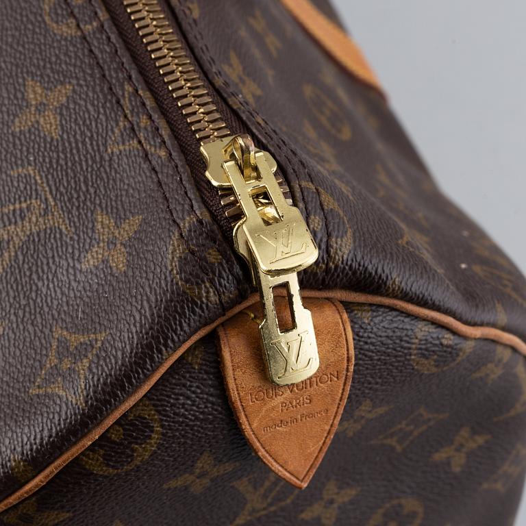 Louis Vuitton,.