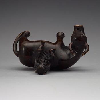 A bronze figure of a flute paying boy on a water buffalo, Qing dynasty (1644-1912).