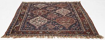 An antique rug, Shiraz, ca. 180 x 155 cm.