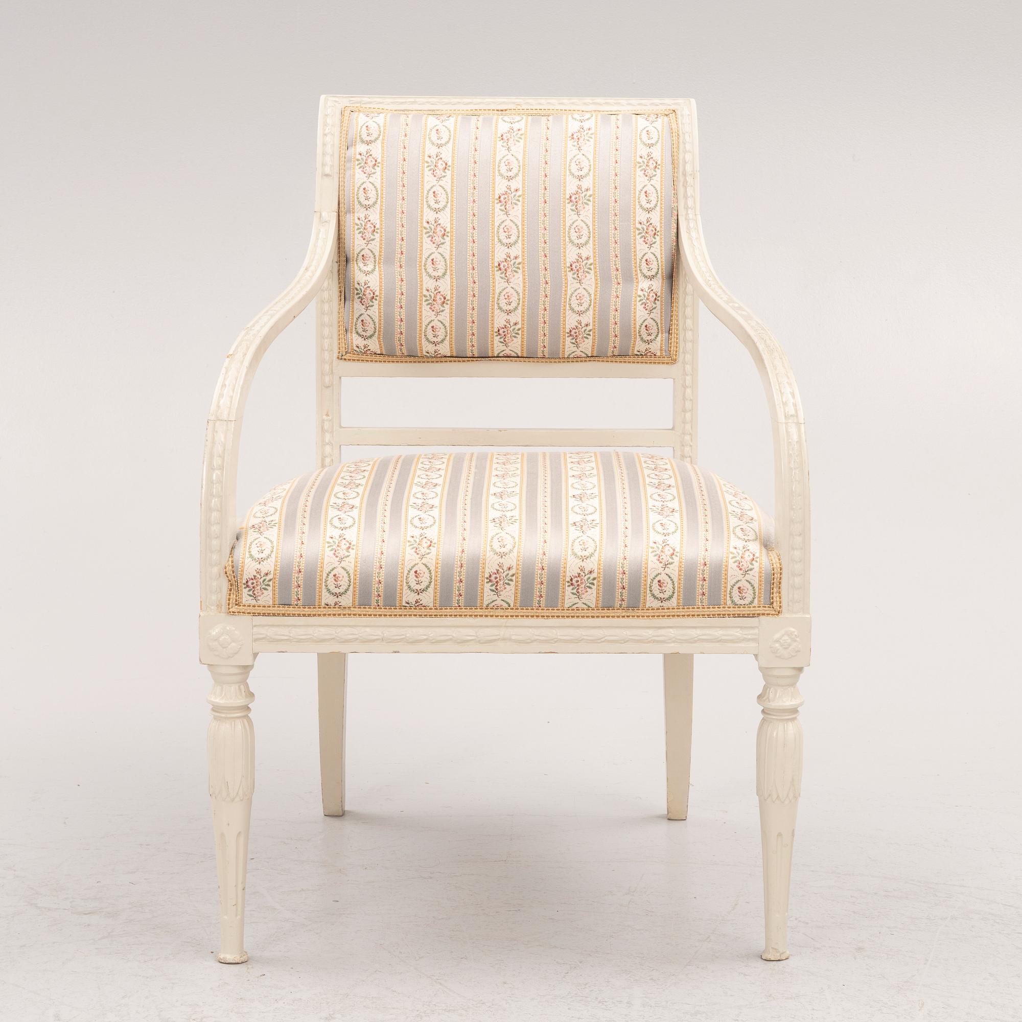 A late Gustavian open armchair, circa 1800.