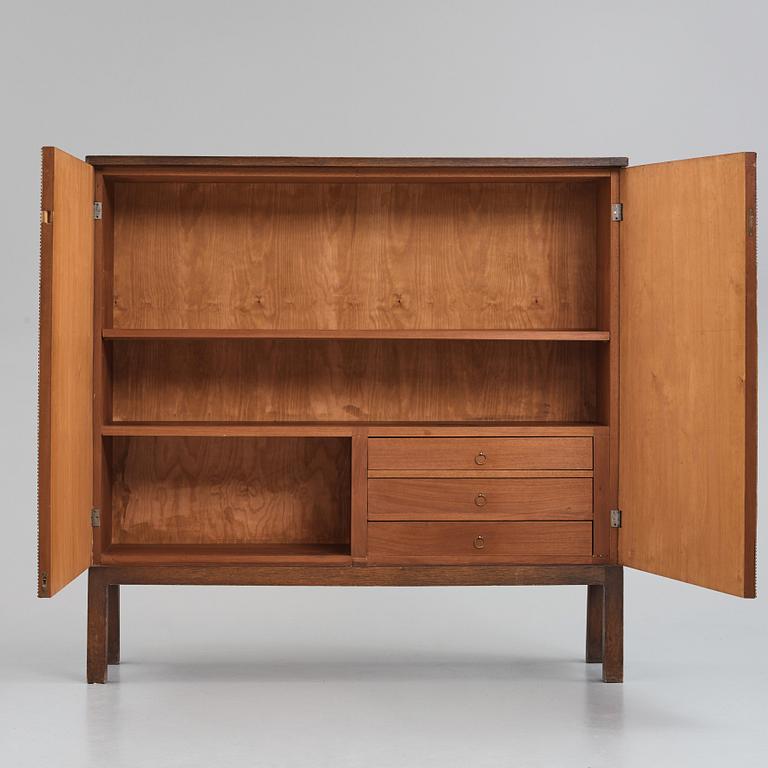 Otto Schulz, a Swedish Modern Zodiac patterned cabinet for Boet, Gothenburg, 1930-1940s.