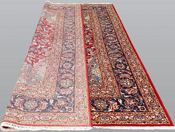 A signed Kashan carpet, ca 313 x 195 cm.