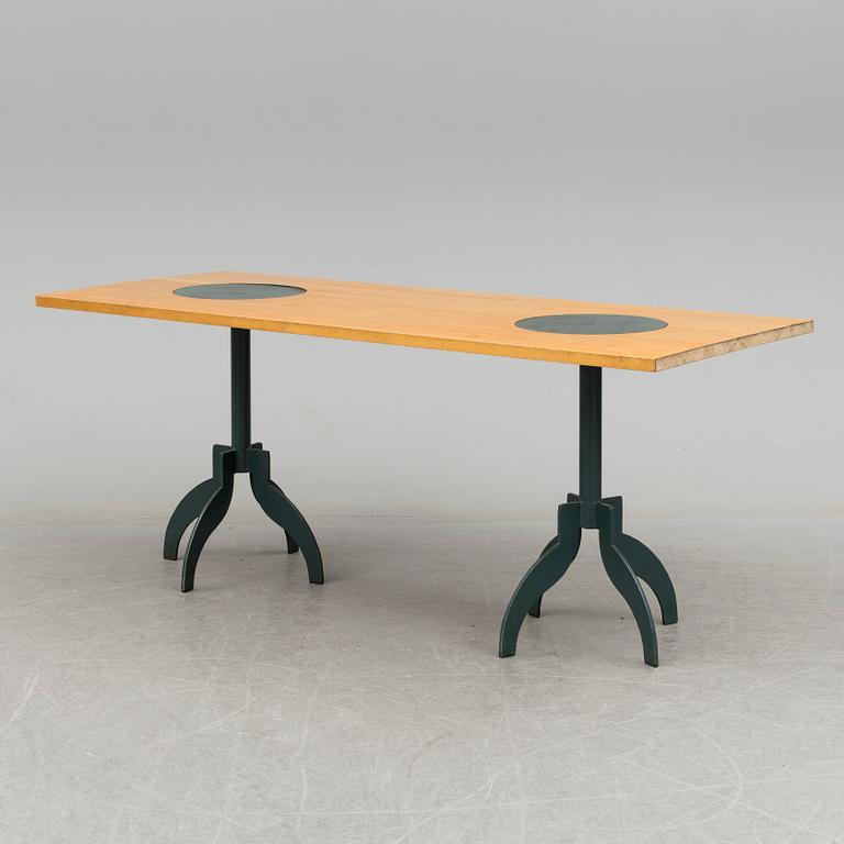 A "Triptyk" dining table by Jonas Bohlin for Källemo.