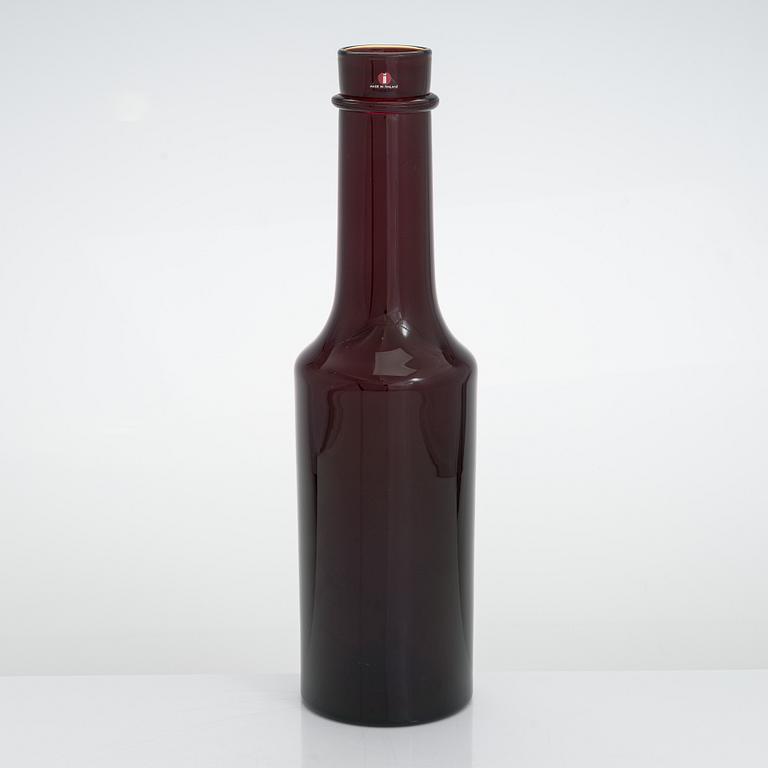 Tapio Wirkkala, A mid 20th century glass bottle for Iittala, signed Tapio Wirkkala.