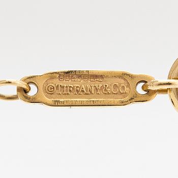 Tiffany & Co, An 18K gold necklace. Marked Tiffany & Co and T & Co.