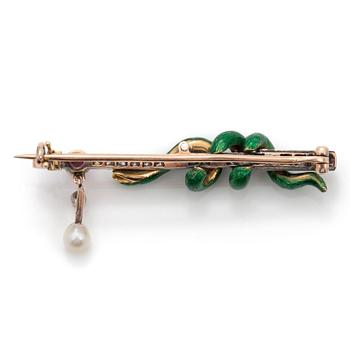 An enamel serpent brooch with a cabochon cut ruby, old- and rose cut diamonds and a pearl.