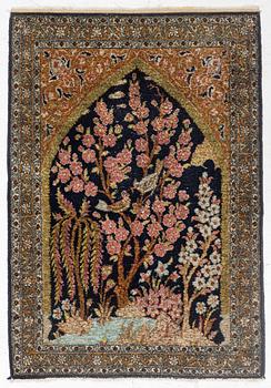 A semi-antique silk Ghom rug, central Iran, c. 32 x 23 in.
