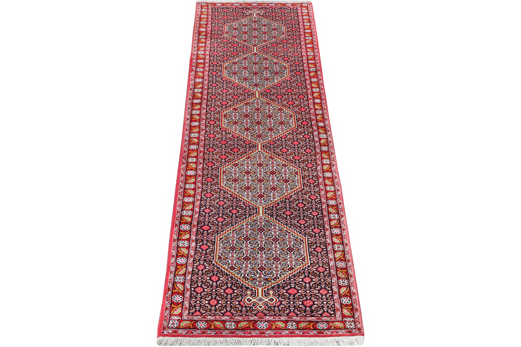 A Runner carpet, Senneh, c. 325 x 80 cm.